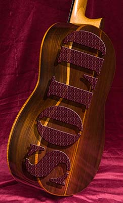 Side view of Brasilian rosewood guitar
